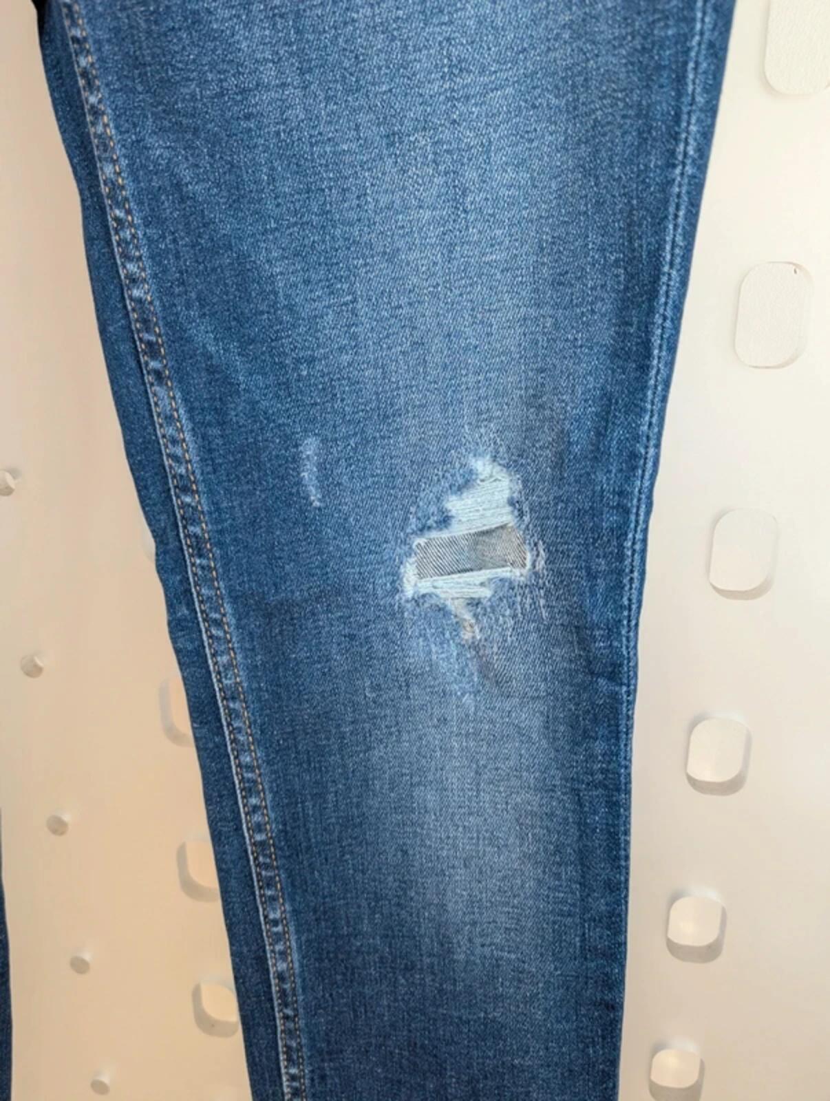 Calvin Klein CKJ011 Mid Rise Skinny Jeans W27